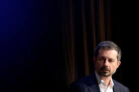 Pete Buttigieg speaking at a conference