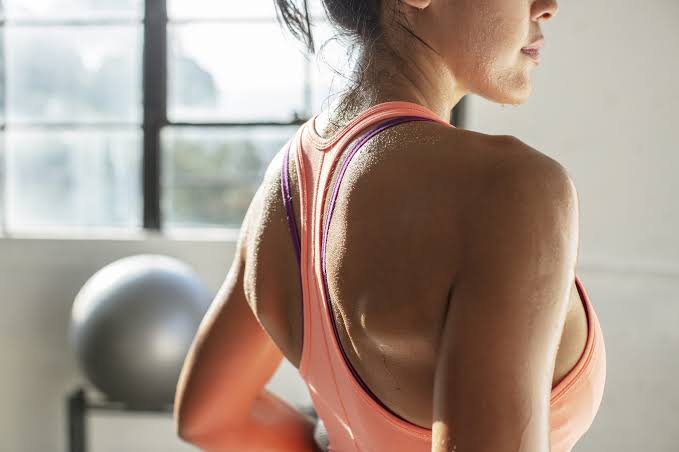 How do you remove sweat smell from a Nike sports bra?