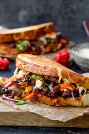14 Savory Sandwich Recipes For Your Picnic Party Community Table Steak Sandwich Recipes Cooking Recipes