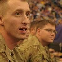 Retired Army Sgt. Brian C. Fleming, left, and Staff