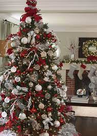 Red and white christmas tree decorations. Decorate Your Christmas Tree Like A Pro With These 7 Tips Balsam Hill Christmas Tree Themes Christmas Decorations Christmas Tree Inspiration