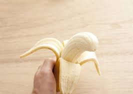 Image result for man eating large banana