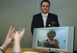 Under title iv of the americans with. File A Video Relay Service Session Helping A Deaf Person Communicate With A Hearing Person Via A Video Interpreter Sign Language Interpreter And A Videophone Dsc0051c Jpg Wikimedia Commons