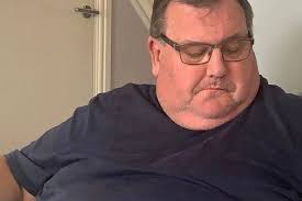 Girl guides build a penny tower for Tarporley St Helen's church appeal