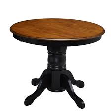 This table suggests a country/cottage style. Classic Black 42 Round Pedestal Dining Table By Home Styles Buy Online In Qatar At Desertcart Productid 2438659