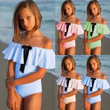 Most baby swimsuits won't have a swim diaper built into the fabric, which leads to extra bulk from wearing both a swim diaper and a swimsuit, plus it's just one more piece of clothing to remember on your way to the pool. Buy Kids Girls Children Summer Solid One Piece Swimsuit Beach Bikini Cute Baby Swimwear Ruffle Bikini Bodysuit Bathing Suit At Affordable Prices Free Shipping Real Reviews With Photos Joom