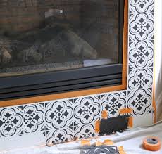 If necessary, hold the stencil firmly to the tile with one hand while painting or sponging the ceramic tile paint on with the other hand. How To Get The Look Of Expensive Real Tile With A Stencil