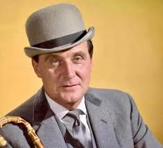 Patrick Macnee (1922–2015) was a suave British actor renowned for his role  as John Steed in The Avengers (1961–1969) and its sequel The New Avengers  (1976–1977). His debonair charm defined the spy