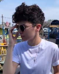 They tend to toe the line between feminine and masculine, often combining elements of popular haircuts and hairstyles like buzz cuts, pixies, mohawks, fades, and bobs. Curly Hair Tomboy Novocom Top