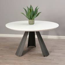 Refusing to choose between style and function, this rectangular table offers a place to share a meal with your family, with an air of medieval modernity. Venus White Dining Table Fab Home Interiors