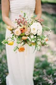 Purple toned lisianthus and carnations. Wildflower Wedding Bouquets