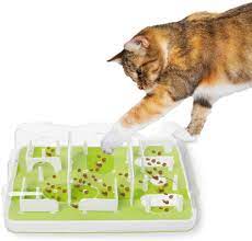 This clever cat puzzle toy, a recyclable cardboard box with inner chambers and holes, encourages your kitty's just fill it with your cat's favorite treats and toys, and watch them spend hours exploring it. Amazon Com All For Paws Interactive Puzzle Cat Feeder Treat Maze Toy For Cats Kitchen Dining