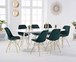 The camillo frosted glass white extending dining table uses an innovative rotating mechanism to extend it from a 6 to 8 seater dining table. Olivia Extending White High Gloss Dining Table With Celine Velvet Gold Leg Chairs Olivia