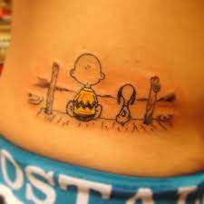 3.5 minimal finger name tattoo. Charlie Brown And Snoopy Tattoo On The Lower Back Tattoo Artist Jay Shin Snoopy Tattoo Lower Back Tattoos Back Tattoos