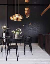 The black dining set that matches the backdrop looks balance with the crystal chandelier. Dark Dining Room Modern Ideas Dark Dining Room Luxury Dining Room Modern Dining Room