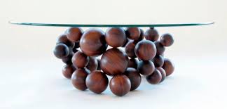 This coffee table has an extending top that lifts up to provide a floating raised work surface, perfectly matches your needs, ideal for working, dining, and extra storage in the living room or office. Float Coffee Table By Liz Boscacci