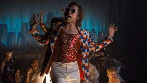 Rocketman is an epic musical fantasy about the incredible human story of elton john's breakthrough years.the film follows the fantastical journey of transformation from shy piano prodigy reginald dwight into international superstar elton john. Rocketman 2019 By Dexter Fletcher Cinematary