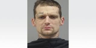 Adrian murder suspect charged with break-in, seeking to kill man in Morenci