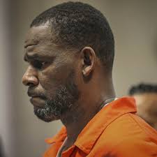 R Kelly had sexual contact with underage boy as well as girls, prosecutors  say