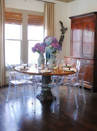 Lucite Chairs With Antique Pedestal Table And Side Cabinet Meg Lonergan Of Lesueur Interiors Wood Table Decor Ghost Chair Dining Room Round Wood Table