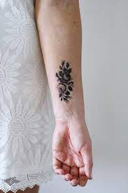 I Love Tattoos With A Vintage Feel To It And This Drawing Of Roses Is Absolutely Perfect It S Cute And S Wrist Tattoo Cover Up Marquesan Tattoos Small Tattoos