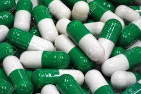 Maybe you would like to learn more about one of these? Green And White Capsules Close Up Stock Photo Picture And Royalty Free Image Image 25194655