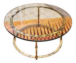 Maybe you would like to learn more about one of these? Mid Century Modern Patina Brass Glass Round Coffee Table 1960s Chairish