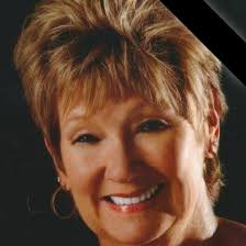 This charming decorative platter features a scenic landscape painting of a  farmhouse surrounded by colorful flowers by Susan Winget. Done in blues,  purples and greens. Its artistic design adds a touch of