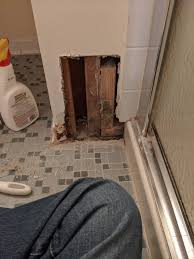 Dip a stiff brush into the mixture and hold it close to the wall, bristles up. Repairing Wall Near Shower And Floor Drywall Repair Home Improvement Stack Exchange