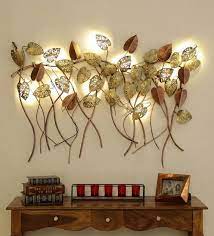 (4.7) out of 5 stars 40 ratings, based on 40 reviews. Buy Wrought Iron Hanging Leaf In Golden With Led Wall Art By Malik Design Online Floral Metal Art Metal Wall Art Home Decor Pepperfry Product