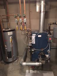 As the flue gases leave the boiler they cool and depending on the dew point of the gas the gas will experience a change of state. Exhaust Smell In House Direct Vent Dunkirk Oil Fired Boiler Heating Help The Wall
