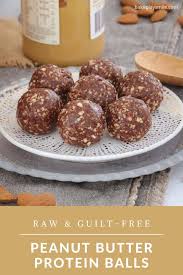 Raw Guilt Free Peanut Butter Brownie Bliss Ballspeanut Butter Protein Balls Recipe In 2020 Peanut Butter Brownies Food Processor Recipes Food