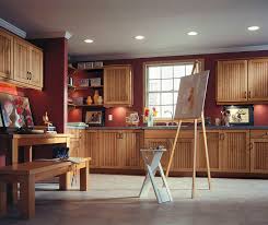 Adding shelves and a desktop allows you to close up shop, keeping the rest of the room uncluttered and aesthetically appealing. Craft Room Cabinets Diamond Cabinetry