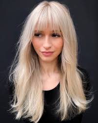 Long blonde hair with blended bangs. 50 Prettiest Long Layered Haircuts With Bangs For 2020 Hair Adviser