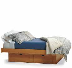 Monkeypod headboard and king platform bed with floating nightstands. Pompanoosuc Mills