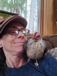 We got a mixed lot last year and one is this tiny little hen. She loves to  ride around in my jacket...or in the scratch grain scoop. Does anyone know  what breed