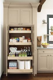 I used the corner clamps underneath to hold the shelves at a 90 degree angle while attaching the first side. Decora Cabinets Tall Pantry Cabinet With Roll Trays Transitional Kitchen Other By Masterbrand Cabinets Inc Houzz