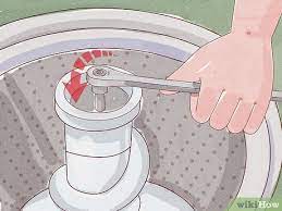 The very first as in fixing your agitator is to take the item out of the washing machine. 3 Ways To Remove A Ge Washer Agitator Wikihow