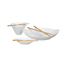 Modern asian serving shape in white porcelain rests bamboo chopsticks in the cutout handles. 6 5 Kai Noodle Bowl With Chopsticks Reviews Crate And Barrel