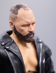 Jon Moxley Ultimate Edition. NJPW 🇯🇵 G1 Climax '19 Holy Shit 1/1 Signed  and Boxed. Entrance jacket, two sets of arms. Multiple hands. Custom middle  fingers. Brand logos. The ACE elbow pad