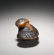 However, a good quality netsuke should not have rough edges or protruding parts that might catch on the wearer's kimono. Sold Wood Netsuke Of A Snail On Fungus Max Rutherston Ltd