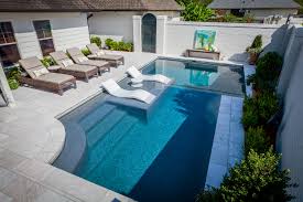 Create The Perfect Outdoor Scene With Ledge Lounger In Pool Furniture Designed For In Water Use On Your Pool S Tanning Pool Designs Pool Houses Backyard Pool