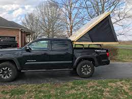 If you're looking for ways to add some extra storage to your car, these 10 easy diy roof rack ideas are the way to go! Roof Top Tent Diy Build Diy Roof Top Tent Diy Tent Roof Top Tent