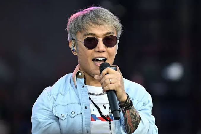 Arnel Pineda fronting Journey live on the 2026 Final Frontier Tour., AI generated