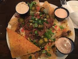 Put about 1/2 c cabbage on top of fish, then 1 tbsp of the cilantro sauce on the cabbage. Southwest Taco Salad And Boneless Wings Picture Of Wild Bill S Sports Saloon Woodbury Tripadvisor