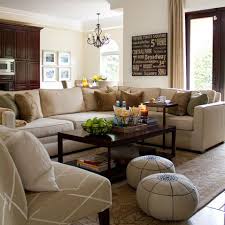 This base sits fully to the floor and is set back two inches for additional contrast, providing a grander illusion of size and space. Living Room Decor With Taupe Sofa Novocom Top