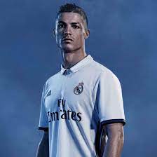 The jersey is in plain white color and has three black stripes on both corners. Cris New Kit 16 17 Cristiano Ronaldo Cristiano Ronaldo Shirt Real Madrid