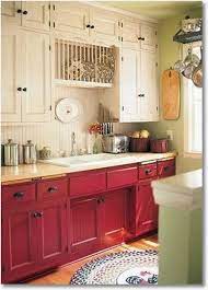 Chalk painted kitchen cabinets — two years later why painting my kitchen cabinets set me free character building: White Red Black Cottage A Cultivated Nest Red Kitchen Cabinets Kitchen Cabinet Colors Kitchen Cabinets