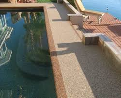 Resurfacing Pool Decks In Las Vegas Nv Pebblestonecoatings Com Stone Pool Deck Pool Decks Pool