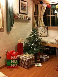 16 Tiny Houses That Are Big On Christmas Spirit Types Of Christmas Trees Amazing Decor Tiny House Decor